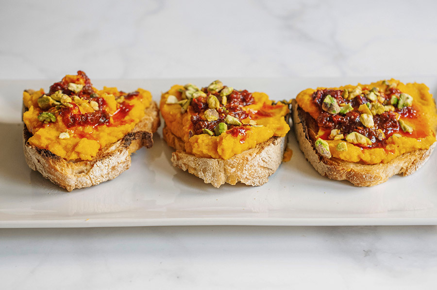 Carrot purée, pistachios and nduja crostini