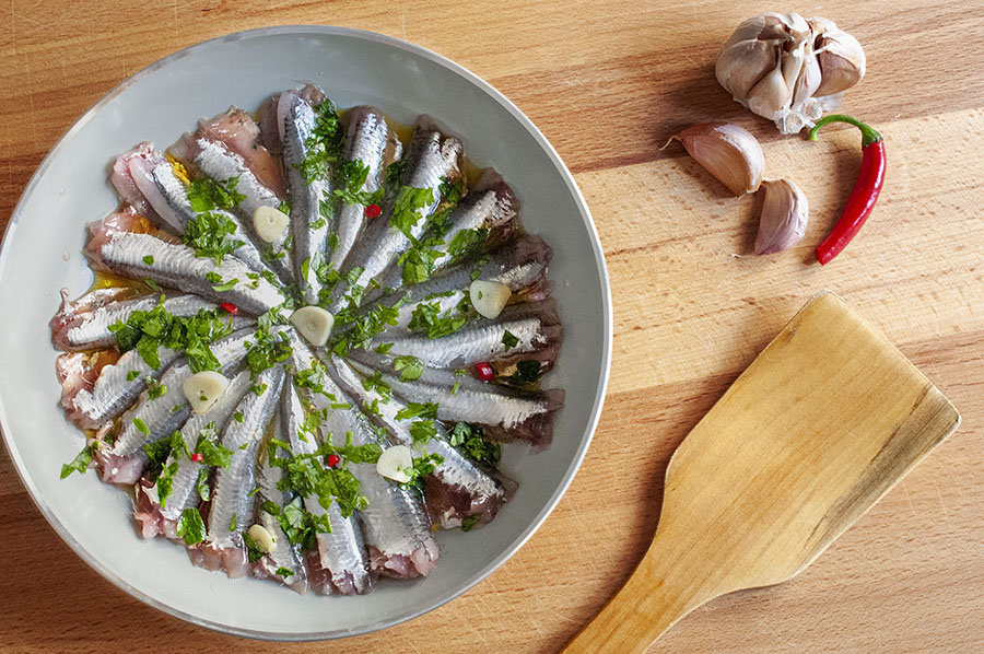 Pan fried fresh anchovies called “Alici in Tortiera”